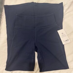 Athleta elation flare pant in navy BNWT!